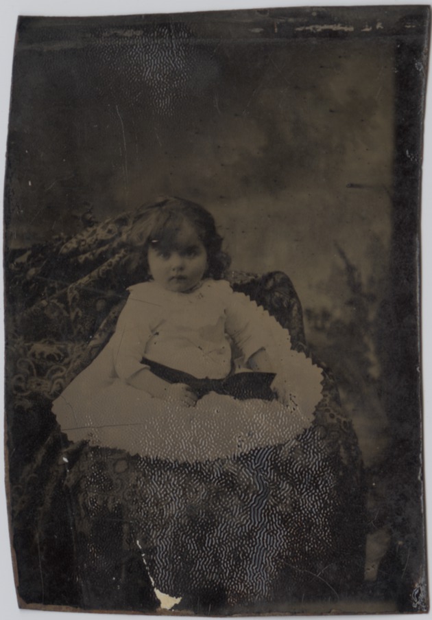 Tintype  of young child seated - 
