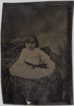 Tintype  of young child seated