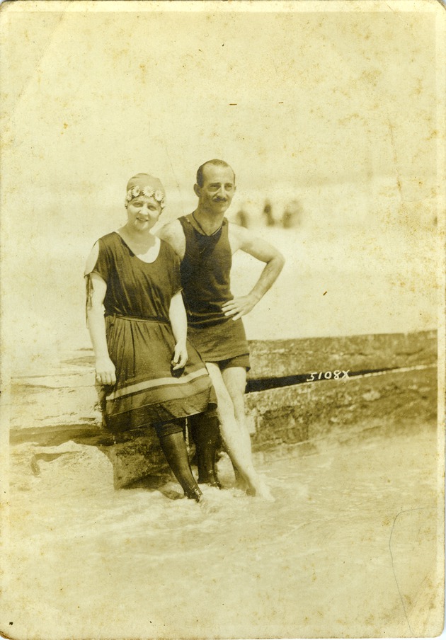 Mana-Zucca and Irwin Cassel pictured in swimming costumes standing in the water - 