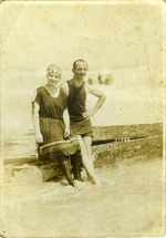 Mana-Zucca and Irwin Cassel pictured in swimming costumes standing in the water