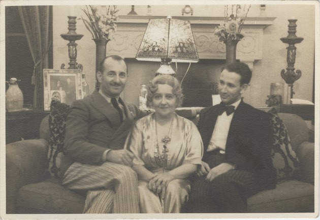 Irwin Cassel, Mana-Zucca, and Marwin Cassel seated on a couch - 