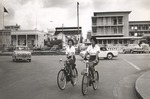 [1960/1969] Two women cycling in Georgetown, British Guiana