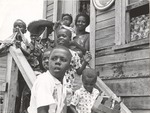 [1960/1979] Children on porch in Haslington, Guyana