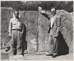 [1962] Two United States students beside Zapotec stone carving, Monte Alban, Mexico