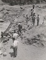 Mexican workers installing a water system