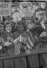 Girl scout troop watching John F. Kennedy speak in Harlem