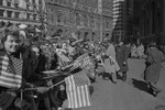 [1962-03-01] Spectators with American flags, Astronaut John Glenn ticket tape parade