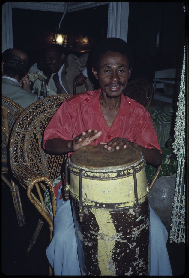 A man playing a drum