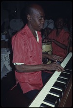 A man playing a piano