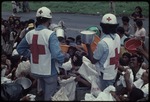 Red cross handing out rice