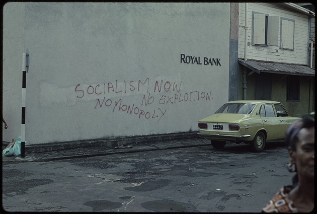 Socialism now. No exploition. No Monopoly. Grafitti on the wall.
