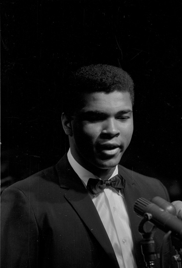 Cassius Clay performing a poetry reading at the Bitter End Club