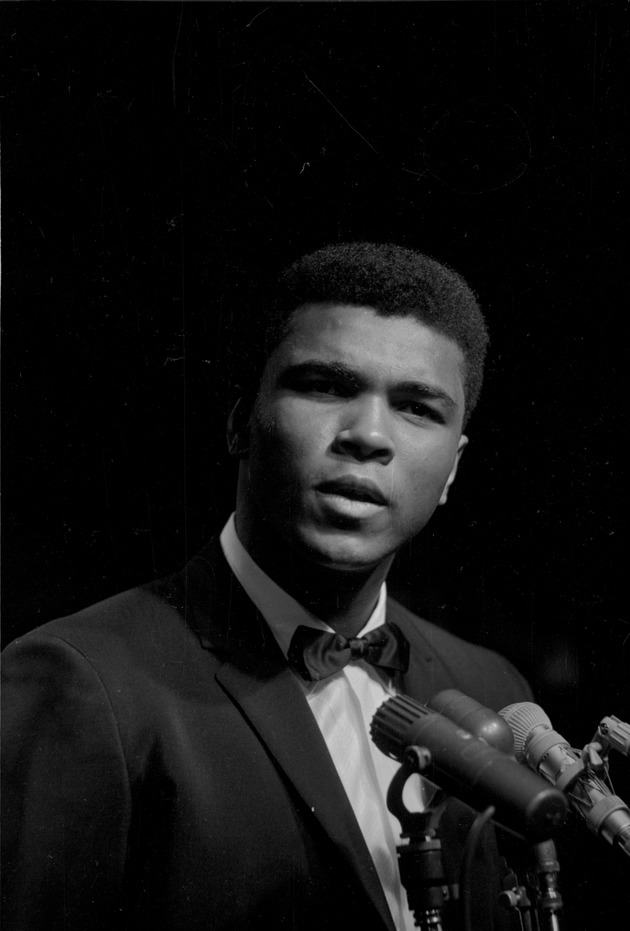 Cassius Clay performing a poetry reading at the Bitter End Club