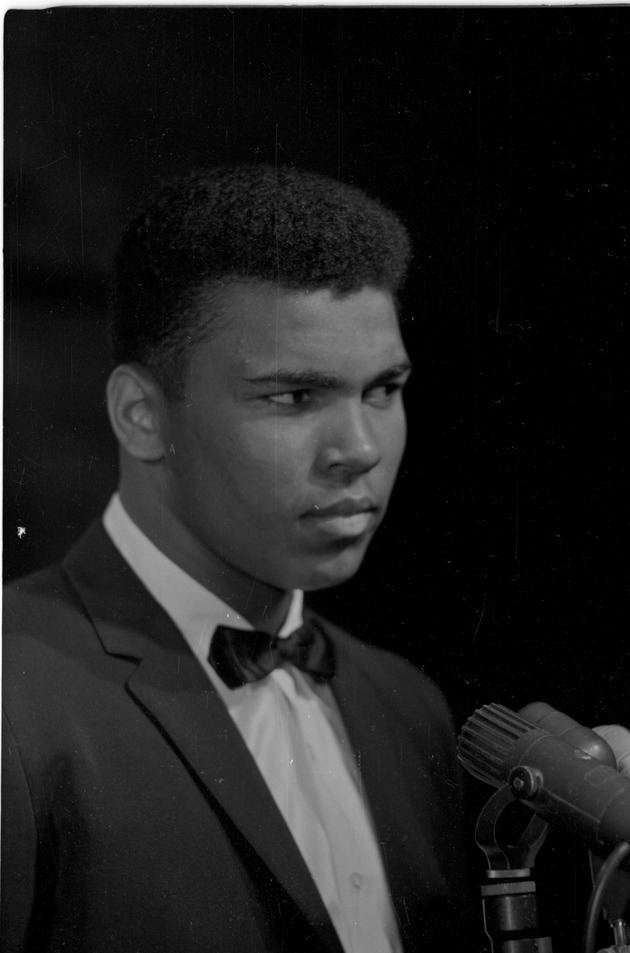 Cassius Clay performing a poetry reading at the Bitter End Club