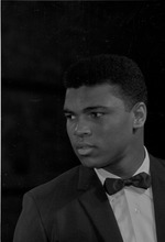 Cassius Clay performing a poetry reading at the Bitter End Club