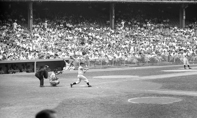 The New York Yankees Roger Maris at bat against the Washington Senators