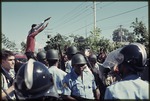 Police and demonstrators in the street  during the 1990 Haitian general election