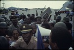 [1980/1990] Haitian colonel Antoine Atouriste provides escort at airport