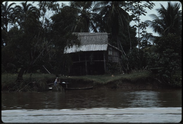 A wooden structure next to the water