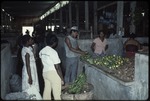 A group of people at indoor market