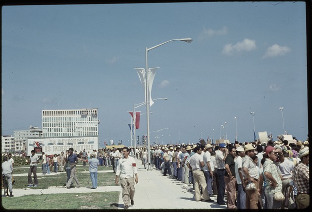 A large group of people standing on the Malecon