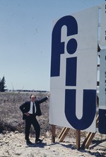 Charles E. Perry at the construction site of the Tamiami Campus
