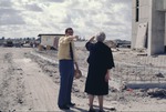 [1971-12] Donald McDowell and Carolyn Lawrence Pearce on the construction site of Tamiami Campus