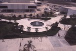 [1975-03] View of Anthenaeum construction, University House and Fountain