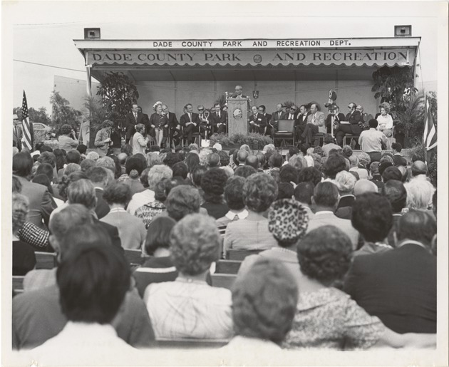 U Thant speaking at podium on stage of the groundbreaking ceremony for Florida International University - Tamiami_Groundbreaking_002_Recto