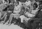 Seated audience at the Florida International University opening day ceremony