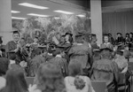 Graduates clapping 1973 Spring Florida International University Commencement