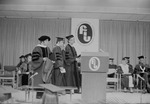 [1973-06-16] President Charles E. Perry, Dr. Juan C. Hernandez and Jose Joaquin Salcedo 1973 Spring Florida International University Commencement