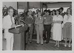 [1984-07-30] Senator Jack Gordon at lectern with faculty and staff of Florida International University