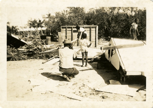 Surveying damage - Recto