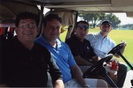 [2007-12-12] Four golfers pose in golf carts