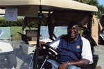 Larry Little in golf cart