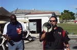 Larry Little and man with bullhorn