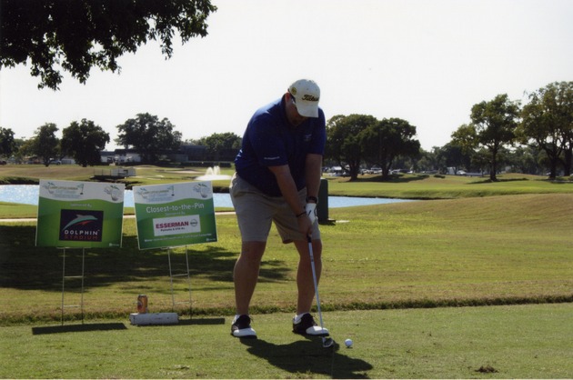 Golfer prepares to swing