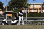Golfer mid-swing