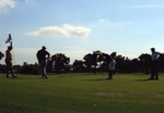 [2007-12-12] Several men playing golf