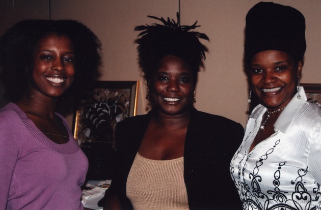 Three women smiling