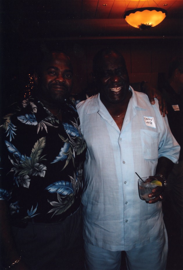 Larry Little poses with man