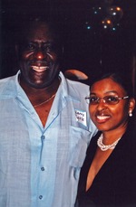 Larry Little poses with woman