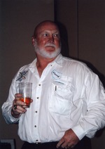 Bob Kuechenberg holding glass