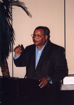 [2008-12] Man speaks at reception