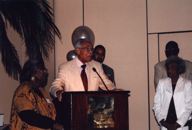 Garth Reeves speaking at reception