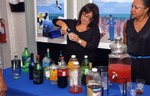 Woman mixes drinks