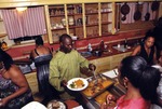 [2010-08-21] Man serving food