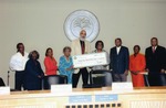 Virginia Key Beach Park Trust members with large check