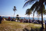 Wide view of people gathered on Virginia Key Beach